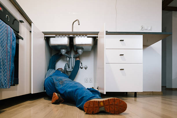 Professional Drain Cleaning technician working in Coral Gables, FL